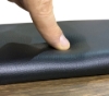 Close-up of padded rail on poker table
