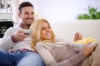 Couple enjoying Bullseye popcorn - lifestyle